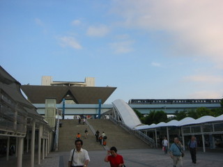 Tokyo Big Sight convention center with rubber-tired Yurikamome Line passing in front