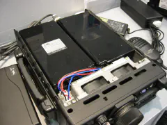 inside the bottom of an FT-897 showing the twin fans and twin 4500 mAH Ni-MH battery packs