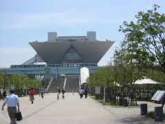 The Tokyo Big Sight International Convention Center, as one of the  Yurikamome trains passes.