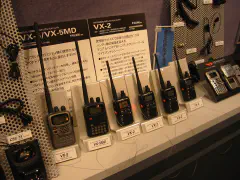 The Yaesu VX-5 50/144/430 HT and the diminutive VX-2 1.5W/1.0W 144/430 HT.