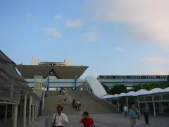 Tokyo Big Sight convention center with rubber-tired Yurikamome Line passing in front