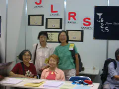 Angela ZL2TI visiting the Japan Ladies Radio Society booth