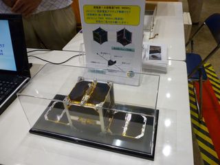 Engineering model of the WE WISH cubesat to be deployed from ISS in September (Meisei Electric Amateur Radio Club). 437.505 downlink (CW beacon, status, and SSTV)