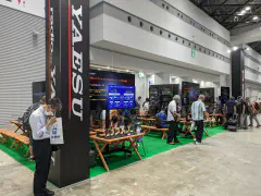 the Yaesu Booth was a collection of picnic tables with the radios available for exploration